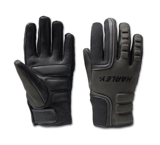 A pair of women's waterproof motorcycle gloves in black, with contrast knitting and a velcro wrist closure.