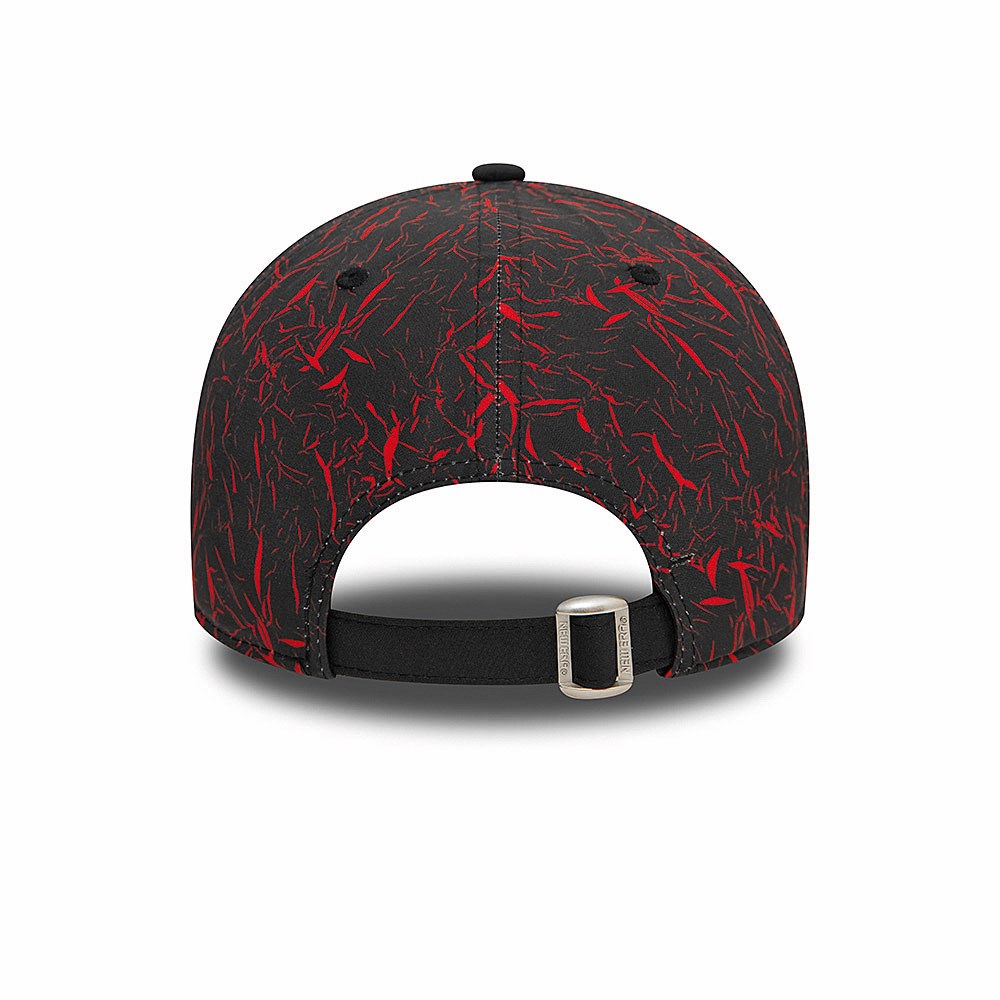 Black and red cap with abstract pattern on a white background